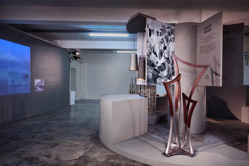 <p>Silent Notes, by the established artist and jeweller Azza Al Qubaisi, is a coat stand that takes its form from a traditional stringed instrument, the Tanbora. Courtesy D3</p>
