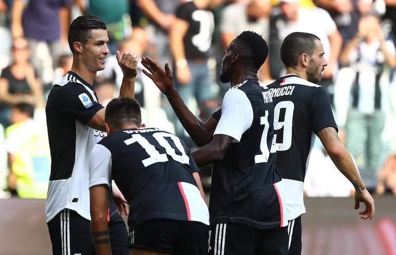 TURIN, ITALY - SEPTEMBER 28:  Cristiano Ronaldo (L) of Juventus FC celebrates his goal with his team-mate Blaise Matuidi during the Serie A match between Juventus and SPAL at Allianz Stadium on September 29, 2019 in Turin, Italy.  (Photo by Marco Luzzani/Getty Images)