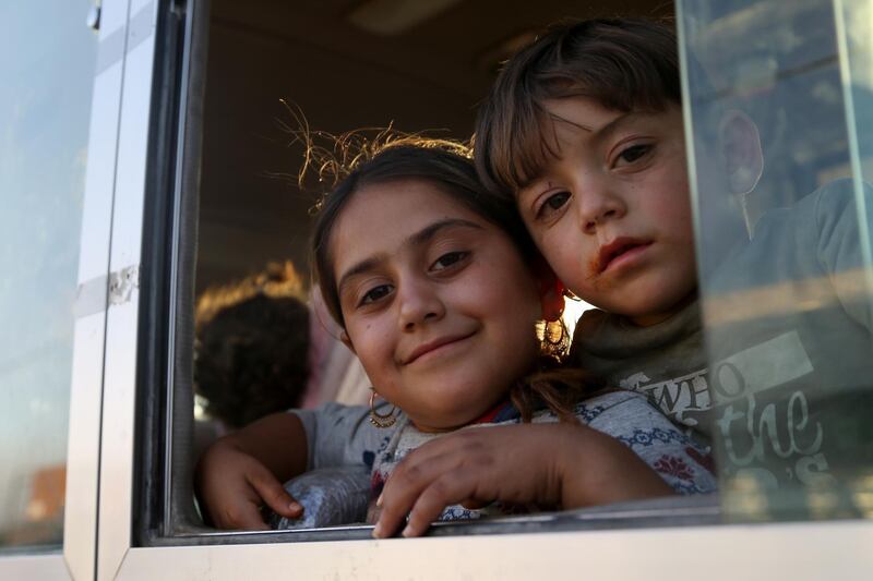 epa07925988 Kurdish Syrian refugees fleeing the Turkish military operation in Syria arrive to Bradasrsh Refugee camp, in Duhok, Kurdistan Region of Iraq, 16 October 2019. Some 280 refugee arrived to Duhok.  EPA/GAILAN HAJI