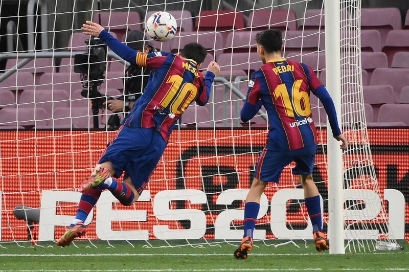 Lionel Messi heads home his 643rd goal for Barcelona. AFP