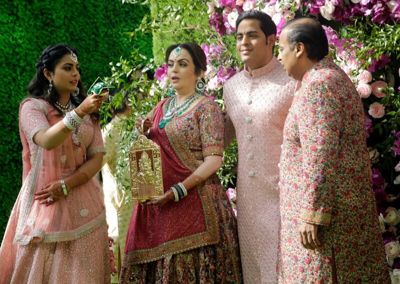 Reliance Industries Chairman Mukesh Ambani, right, his wife Nita Ambani, second left, son Akash Ambani and daughter Isha arrive for Akash's wedding in Mumbai, India, Saturday, March 9, 2019. Photo: AP