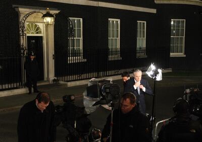 Huw Edwards reporting from Downing Street for the BBC. PA