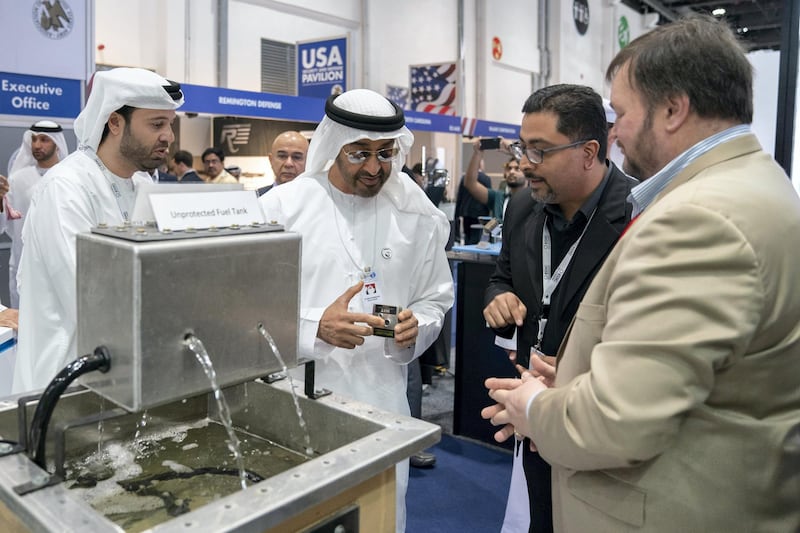 ABU DHABI, UNITED ARAB EMIRATES - February 18, 2019: HH Sheikh Mohamed bin Zayed Al Nahyan, Crown Prince of Abu Dhabi and Deputy Supreme Commander of the UAE Armed Forces (2nd L) tours the 2019 International Defence Exhibition and Conference (IDEX), at Abu Dhabi National Exhibition Centre (ADNEC).

( Mohamed Al Hammadi / Ministry of Presidential Affairs )
---