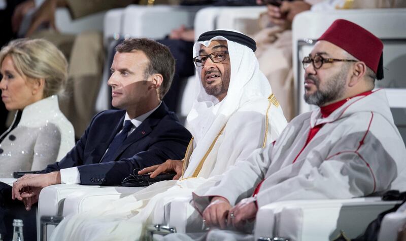 SAADIYAT ISLAND, ABU DHABI, UNITED ARAB EMIRATES - November 08, 2017: HM King Mohamed VI of Morocco (R), HH Sheikh Mohamed bin Zayed Al Nahyan, Crown Prince of Abu Dhabi and Deputy Supreme Commander of the UAE Armed Forces (C) and HE Emmanuel Macron, President of France (3rd R), attend the opening ceremony of the Louvre Abu Dhabi. 
( Hamad Al Kaabi / Crown Prince Court - Abu Dhabi )
—