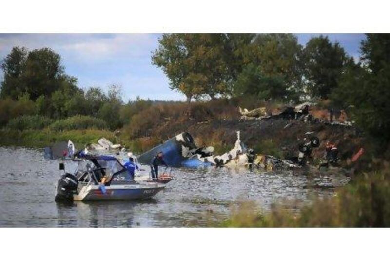 Emergency workers search the wreckage of a plane that crashed near the Russian city of Yaroslavl. Reuters