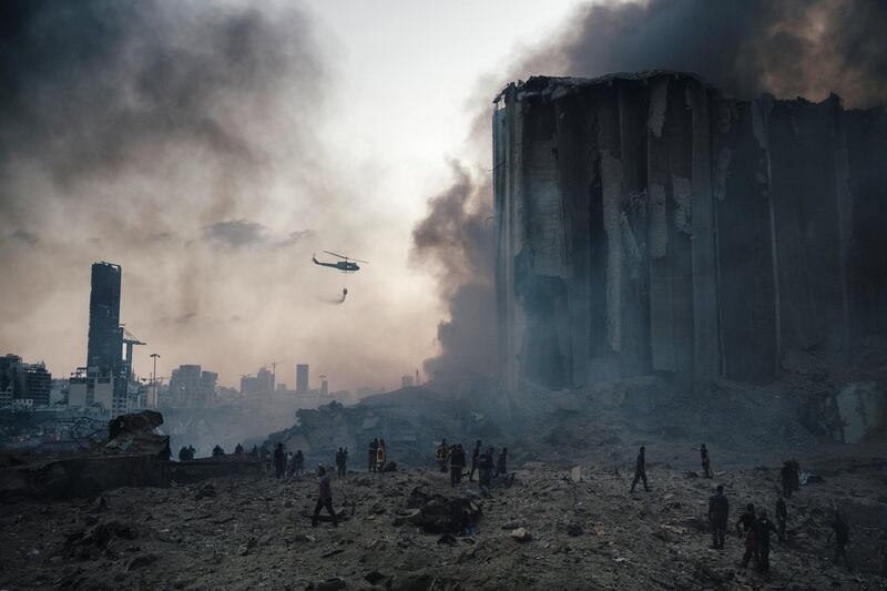 BEIRUT, LEBANON - AUGUST 4:
Firefighters work to put out the fires that engulfed the warehouses in the port of Beirut after the explosion. 
(Photo by Lorenzo Tugnoli/ Contrasto for The Washington Post)