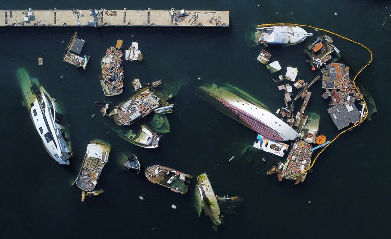 Damaged boats a month after Hurricane Otis hit Acapulco, Mexico. Reuters