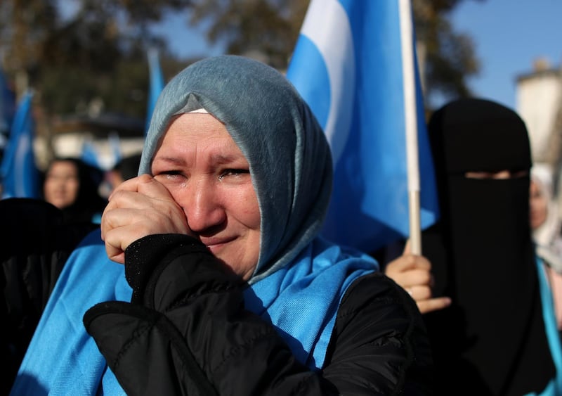 A Uyghur woman cries during a protest against China in Istanbul, Turkey. The protest aims to highlight the critical situation of alleged human rights abuses of the Uyghur people and many other minority groups across the Xinjiang (East Turkestan) area in China.  EPA