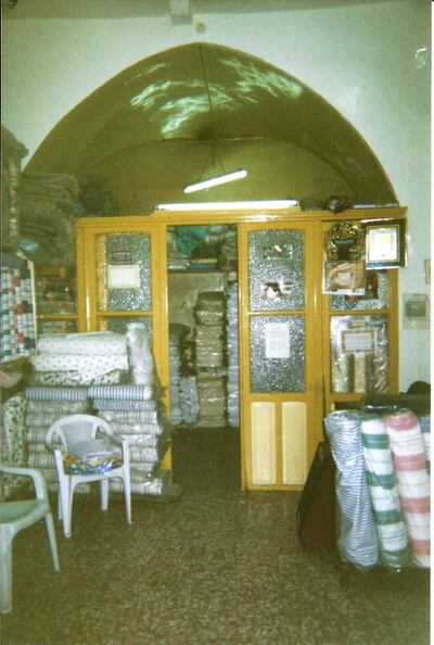 The family textile shop relocated some years ago from Al-Madina Souq, above, to a safer part of Aleppo, operating out of the ground-floor apartment where Nabil Nayal grew up. His childhood bedroom is now the shop front. Courtesy Nabil Nayal