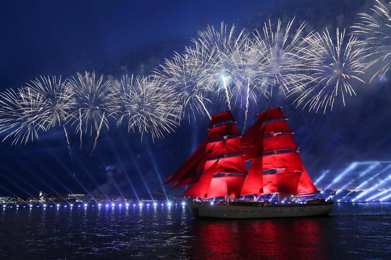 Fireworks explode over the brig Rossiya as it floats on the Neva River during the Scarlet Sails festivities marking school graduation in Saint Petersburg, Russia. Reuters