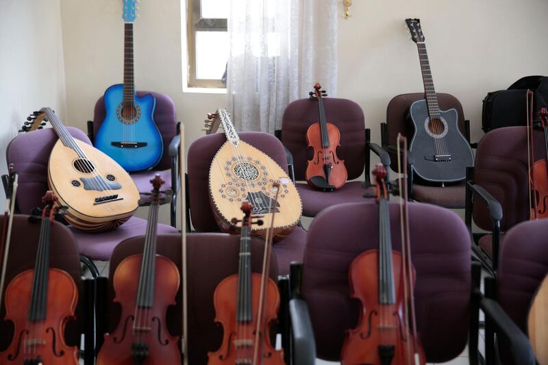 Musical instruments sit on chairs during a break of a music class at the Cultural Centre in Sanaa, Yemen, on April 9, 2018. Hani Mohammed / AP Photo