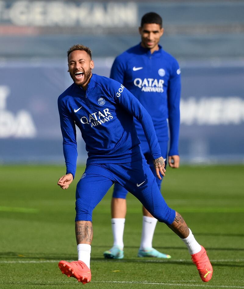 Neymar jokes during a training session at PSG's Camp des Loges training ground. AFP