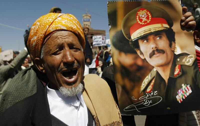 A supporter of Yemen's ousted president Ali Abdullah Saleh protests against foreign interference in Yemen. Photo/Hani Mohammed / AP