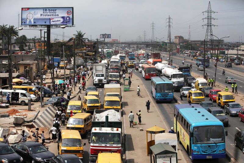 ADVANCE FOR USE MONDAY, OCT. 1, 2012 AND THEREAFTER - In this Wednesday, Aug. 15, 2012 photo, traffic backs up along a busy road in Lagos, Nigeria. In the metropolis of 17.5 million, which is predicted to overtake Cairo as Africa's most populous city in 2015, the traffic jams that Nigerians call "go-slows" can strike at any moment. Here, drivers are hostage to a road network that hasn't been upgraded since the 1970s. (AP Photo/Sunday Alamba)