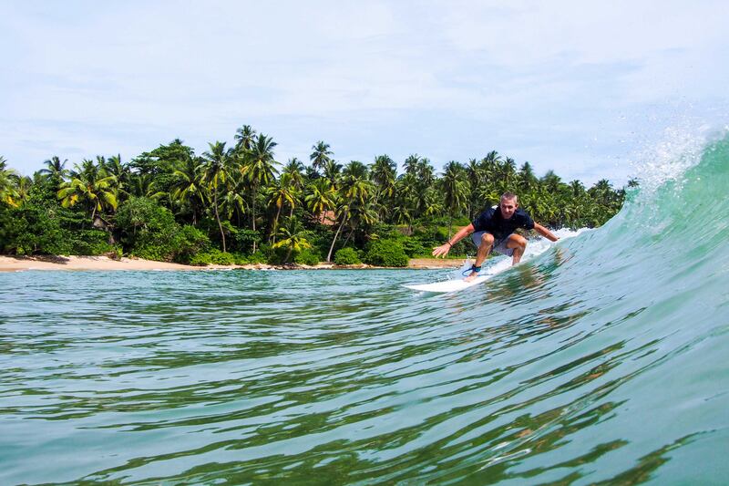 Surfing at Anantara Tangalle.