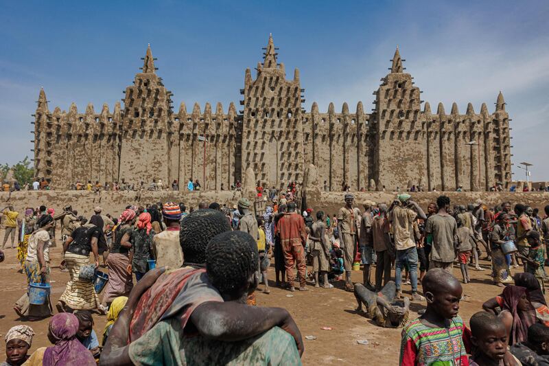 The Great Mosque of Djenne, which was built in 1907, in central Mali. Thousands gather each year to replaster the walls with mud. AFP