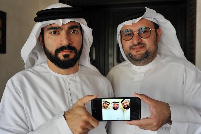 Suhaib Al Bastaki, left, and his brother Abdulla Al Bastaki have nothing but fond memories of their father, Mohammed Ali Al Bastaki, who was one of the five Emirati humanitarian workers killed in the terrorist attack in Kandahar this week. Delores Johnson / The National