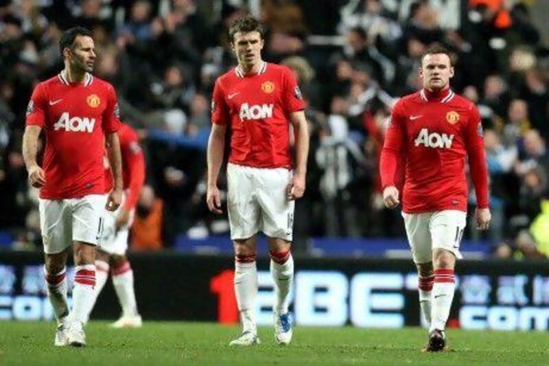 Michael Carrick, left, and Wayne Rooney know it would be nice to knock out Manchester City after a chaotic build-up.