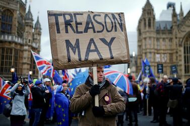 Protesters outside the Houses of Parliament in London. Reuters