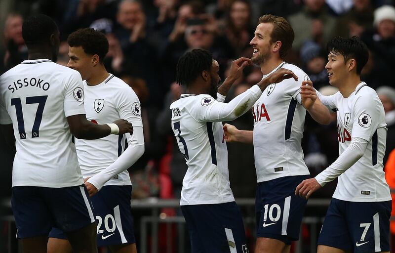 epa06406112 Tottenham Hotspur's Harry Kane (2nd R) celebrates scoring his third goal during the English Premier League soccer match between Tottenham Hotspur and Southampton at Wembley Stadium, London, Britain, 26 December 2017.  EPA/NEIL HALL EDITORIAL USE ONLY. No use with unauthorized audio, video, data, fixture lists, club/league logos or 'live' services. Online in-match use limited to 75 images, no video emulation. No use in betting, games or single club/league/player publications