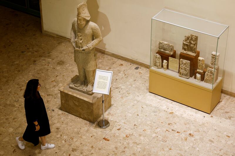 Visitors tour Iraq's National museum in Baghdad. It has reopened to the public after a three-year closure due to the spread of Covid-19 and local unrest. 