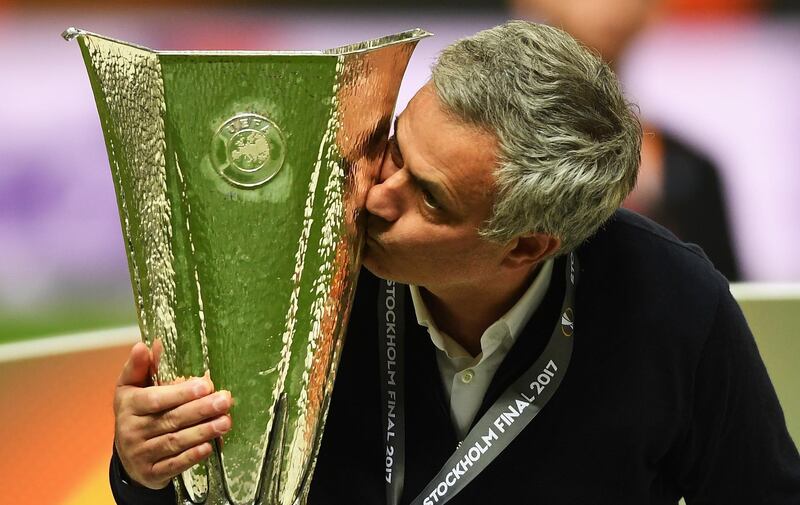 STOCKHOLM, SWEDEN - MAY 24:  Jose Mourinho, Manager of Manchester United kisses the trophy following victory in the UEFA Europa League Final between Ajax and Manchester United at Friends Arena on May 24, 2017 in Stockholm, Sweden.  (Photo by Mike Hewitt/Getty Images)