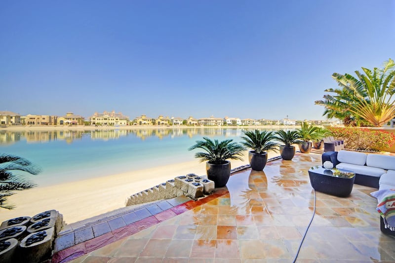 Palm Jumeirah: A four-bedroom villa with a beach front setting and private beach access. Secure gated community, perfect for families with landscaped gardens and swimming pool. Price: Dh9,000,000