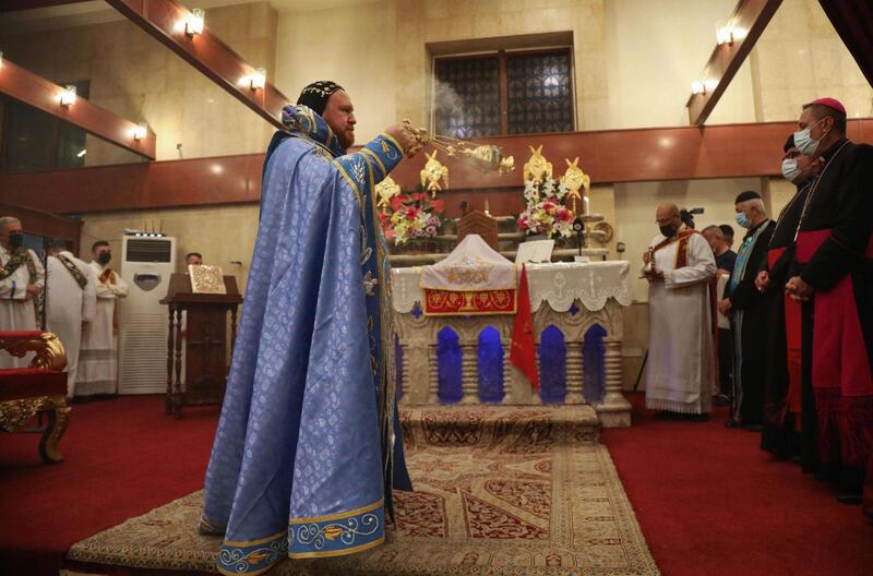 Syriac Orthodox Metropolitan Bishop of Mosul Mor Nicodemos Daoud Matti Sharaf leads an Easter service at the Syriac Orthodox Church of Um Al Noor in Erbil, the capital of the autonomous Kurdish region in northern Iraq. AFP