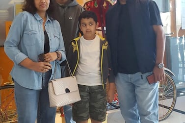 Aditya Dewasthalee, a student at Lancaster University, with his parents and brother. He hopes to be able to fly back to the Emirates to see them at the end of term. Courtesy: Aditya Dewasthalee