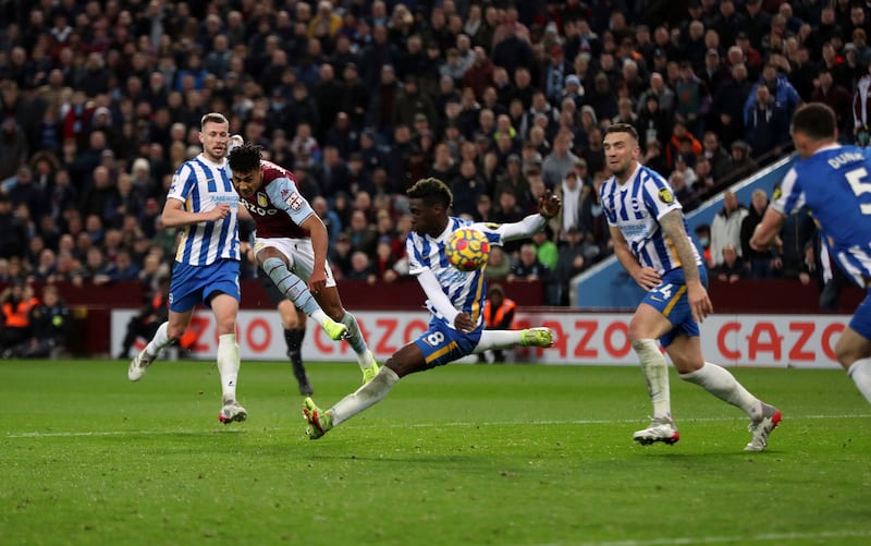 Aston Villa's Ollie Watkins scores the opening goal. AP