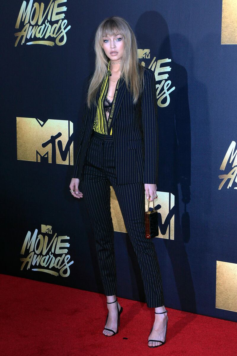 epa05252256 US model Gigi Hadid arrives for the 2016 MTV Movie Awards at the Warner Brothers Studios in Burbank, California, USA, late 09 April 2016. The movies are nominated by producers and executives from MTV and the winners are chosen online by the general public.  EPA/NINA PROMMER