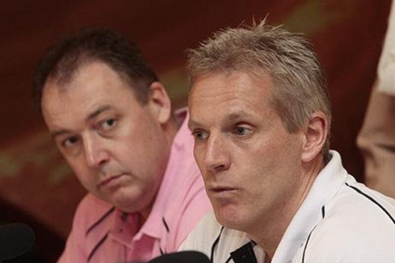 This is a 2009 photograph of Peter Moores, right, who is likely to get the nod to coach the England national cricket team again. Jeffrey E Biteng / The National