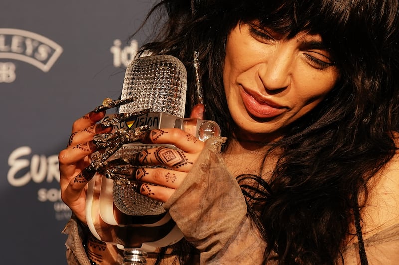Loreen holds her trophy after winning the 2023 Eurovision Song Contest in Liverpool, UK. PA