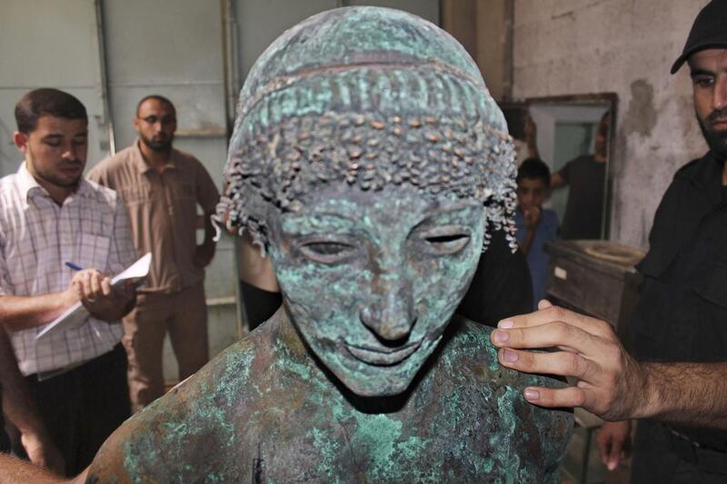 A bronze statue of the Greek god Apollo that was lost for centuries and reported to have been fished from the sea by a Gaza fisherman last August. Gaza Ministry of Tourism and Antiquities / Reuters