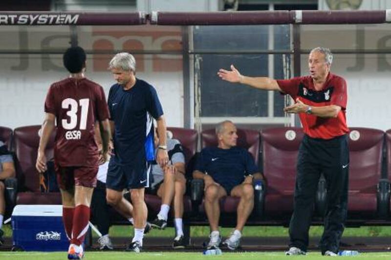 Abu Dhabi, United Arab Emirates, Aug 09 2011, Al Whada vs Oman-  (right) Al whada's Head coach Josef Hickersberger gives instructions to his team  during a friendly match with Oman. Mike Young / The National  