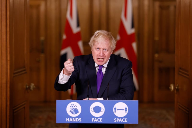 Mr Johnson speaks during a news conference on the Covid-19 pandemic in December 2020