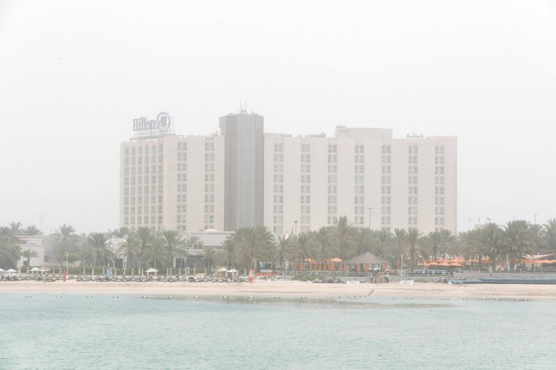 Abu Dhabi, U.A.E., July 6, 2018.
Abu Dhabi hazy weather shot from downtown AUH.  The Hilton Hotel Corniche.
Victor Besa / The National
Section:  NA
For:  weather images for Olive Obina