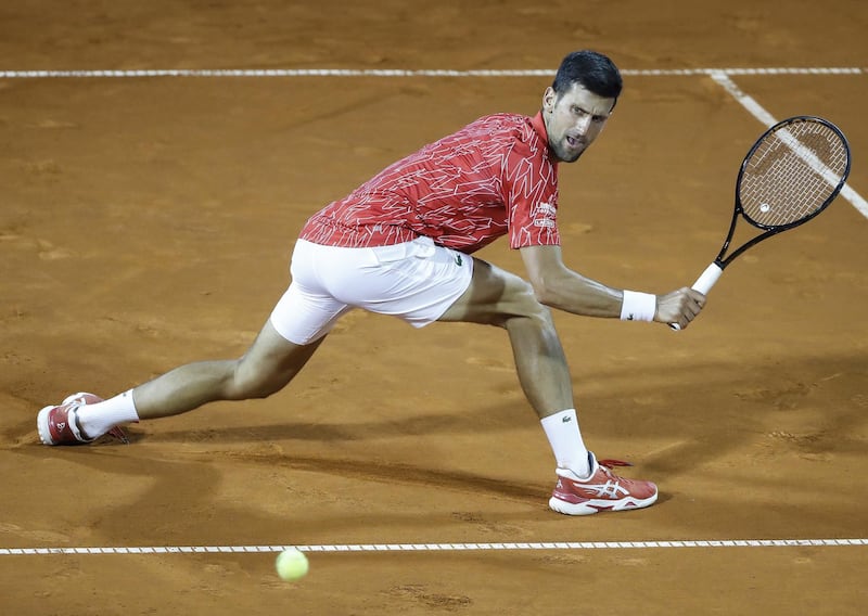 Novak Djokovic of Serbia returns the ball to Filip Krajinovic during the Adria Tour charity exhibition in Belgrade. Getty