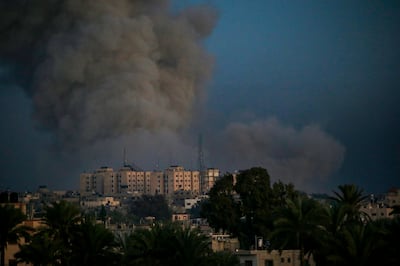 Smoke rises during Israeli military operations east of the Al Maghazi and Al Bureij refugee camps, in the southern Gaza Strip. EPA