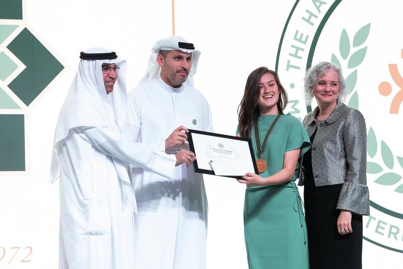 ABU DHABI, UNITED ARAB EMIRATES - May 16 2019.

 American Community School student, Hannah Watkins (Gr 11), is awarded the 2nd Haitham Zamzam Al Hammadi Medal of International Friendship.
 
Launched in 2018, the Haitham Zamzam Al Hammadi Medal of International Friendship is an annual award given to one Junior ACS student for their contribution related to productive and positive global citizenry.

(Photo by Reem Mohammed/The National)

Reporter: 
Section: NA