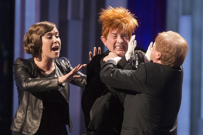 Serena Ryder, left, Dave Foley, right, and Martin Short as the puppet Leon, centre, perform a sketch. The Canadian Press, Chris Young / AP photo