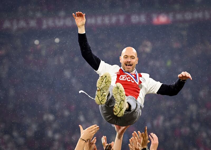Ajax coach Erik ten Hag celebrates with his team after winning the Dutch league in Amsterdam. EPA