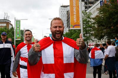 England supporters in fancy dress on Olympic Way as they arrive at Wembley Stadium for the Euro 2020 match against Germany on June 29. Tolga Akmen/AFP