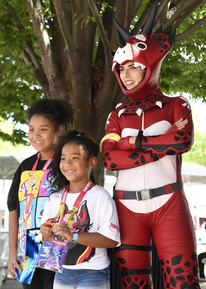 Fans attend day one of the Fortnite World Cup Finals at Arthur Ashe Stadium in the Queens borough of New York City. AFP