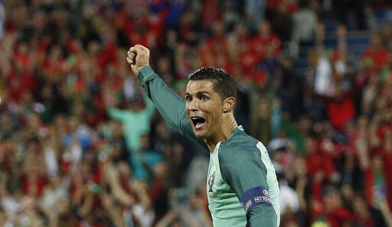 Portugal's Cristiano Ronaldo celebrates after Ricardo Quaresma scores against Croatia. (REUTERS/Lee Smith)
