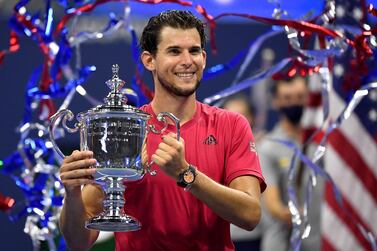 FILE PHOTO: Sep 13 2020; Flushing Meadows, New York, USA; Dominic Thiem of Austria celebrates with the championship trophy after his match against Alexander Zverev of Germany (not pictured) in the men's singles final match on day fourteen of the 2020 U. S.  Open tennis tournament at USTA Billie Jean King National Tennis Center.  Mandatory Credit: Danielle Parhizkaran-USA TODAY Sports / File Photo
