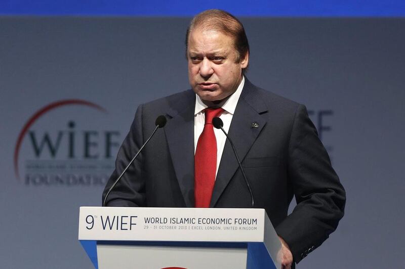 Pakistan's prime minister Nawaz Sharif addresses delegates during the ninth World Islamic Economic Forum in London. Sang Tan / AP Photo