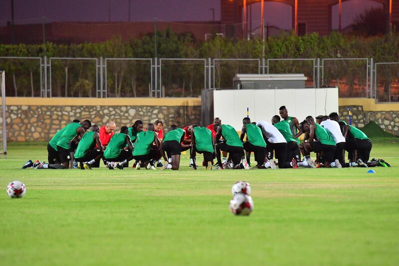 Senegal's players exchanges words as they prepare for Friday's final. AFP