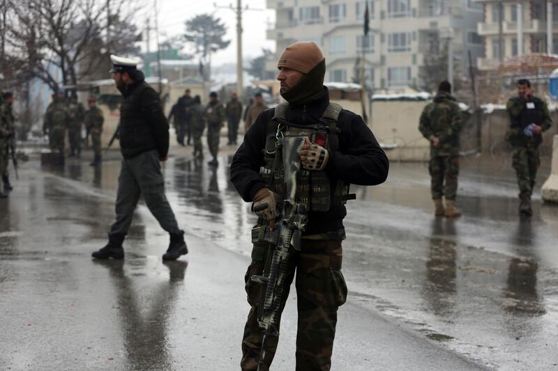 National army soldiers stand guard at the site of suicide attack near the military academy in Kabul, Afghanistan. AP Photo