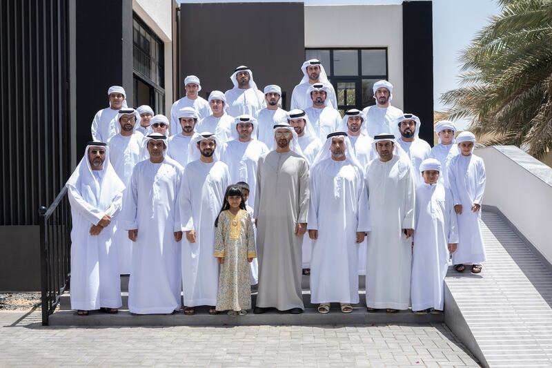Sheikh Mohamed bin Zayed, Crown Prince of Abu Dhabi and Deputy Supreme Commander of the Armed Forces, during a visit to the home of Dr Omar Habtoor Al Derei, Director General of the UAE Fatwa Council (front row, 6th right). All photos: MOPA